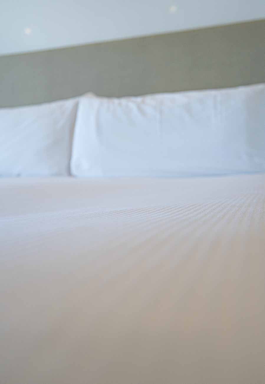bedding in hotel room