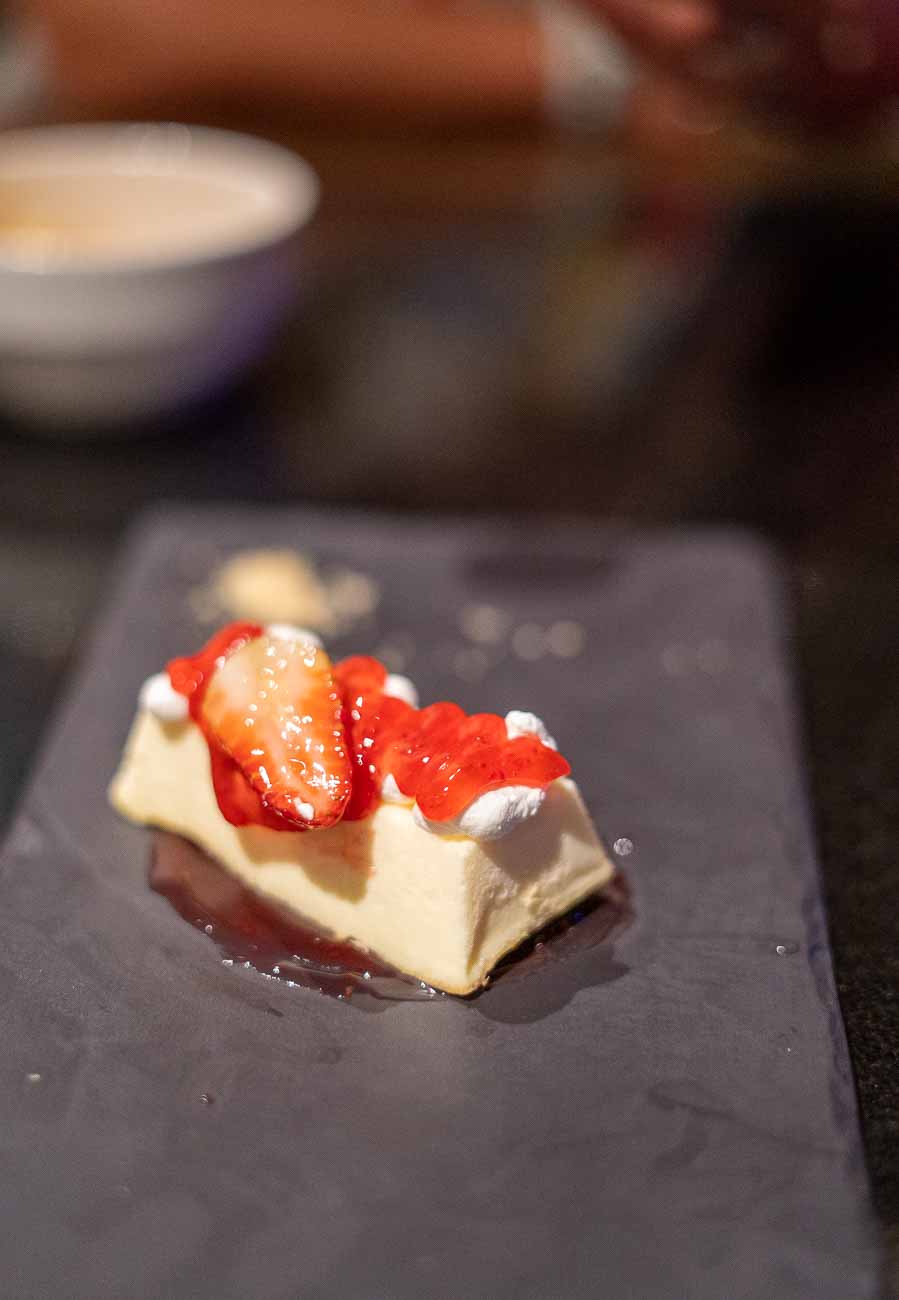 cheesecake plated with strawberry