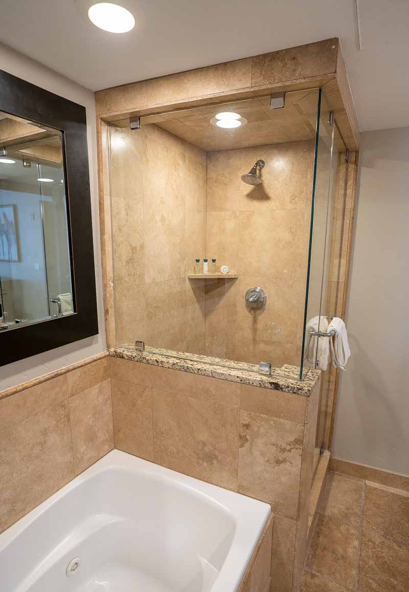 Waldorf Park City king bed suite bathroom shower